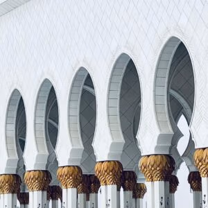 Majestic arches and domes of Sheikh Zayed Grand Mosque in Abu Dhabi.